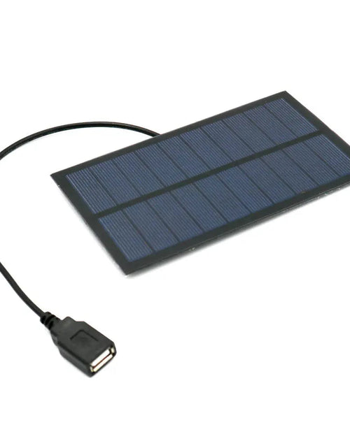 Load image into Gallery viewer, Portable USB Solar Charger with solar panel and USB connector for high efficiency outdoor charging.
