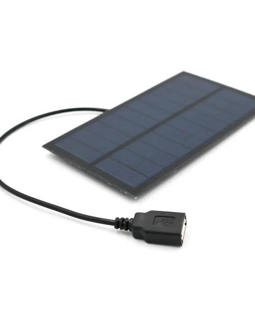 Load image into Gallery viewer, Portable USB Solar Charger solar panel with charging cable for outdoor use.
